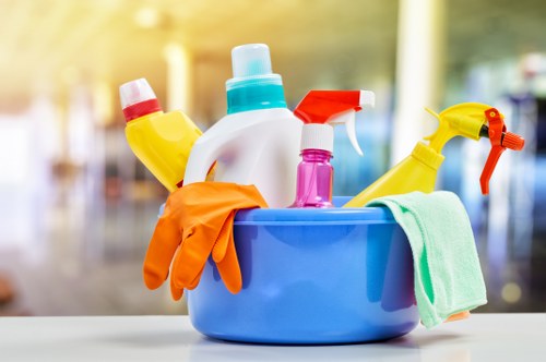 Cleaner preparing a city flat for end of tenancy inspection in EC2