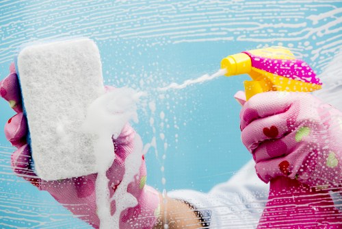 Domestic cleaners working in a modern EC2 property