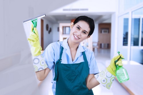 Professional cleaner handling a domestic clean in EC2