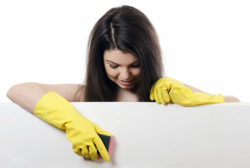 Local domestic cleaner preparing a tidy living room in EC2